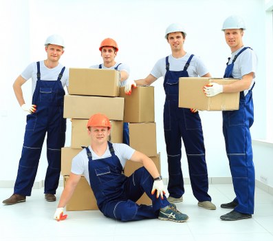 Careful furniture handling during a flat move in Kentish Town