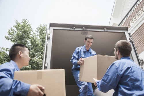 Packed boxes and furniture ready for transport in a Kentish Town property
