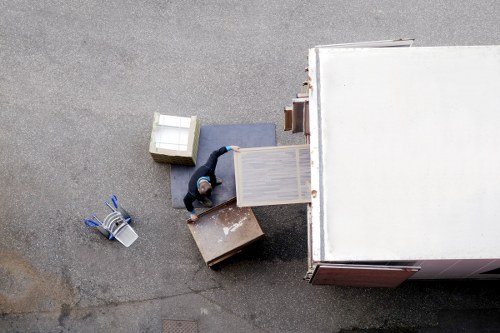 Van loading household furniture for a Kentish Town customer