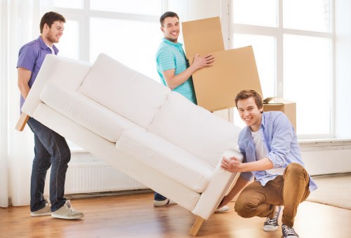 Professional moving van loaded with furniture in an urban London street