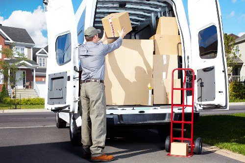 Boxes and furniture prepared for transport by removal van