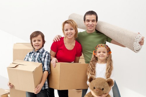Packed household items protected for transport during a flat move
