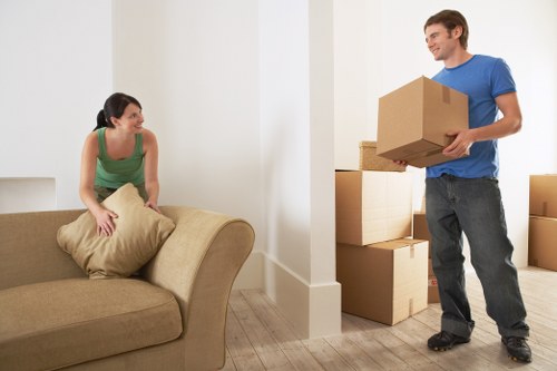 Unpacking boxes in a newly moved-into Kentish Town home